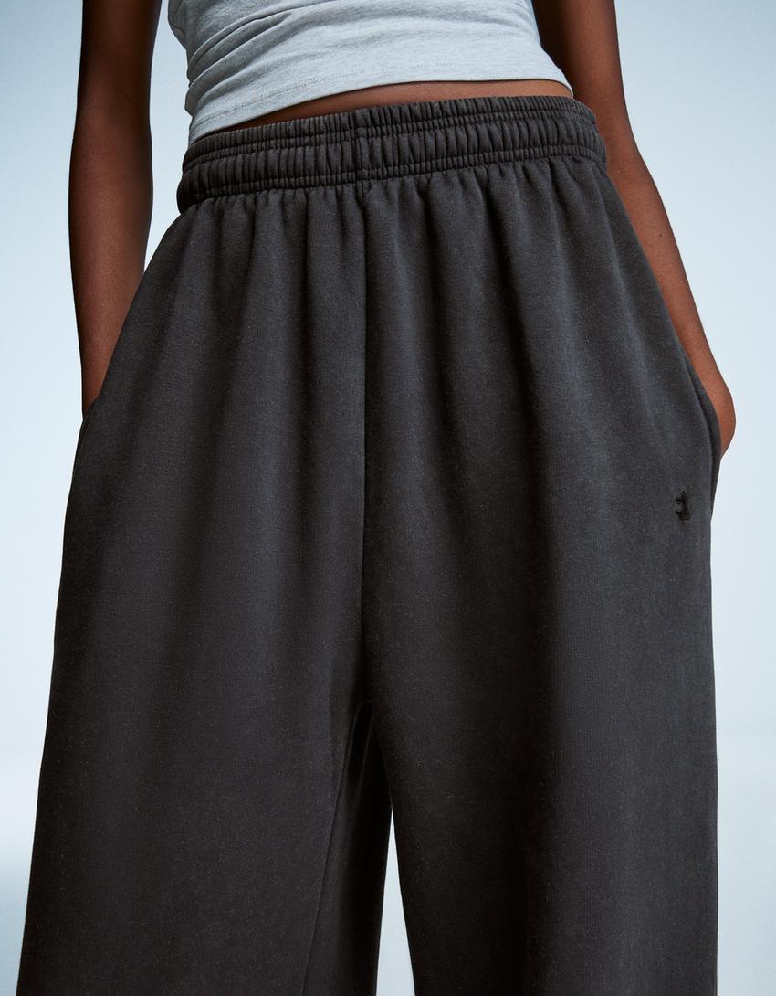 PANTALON JOGGER FIT EN MOLLETON À STOPPERS